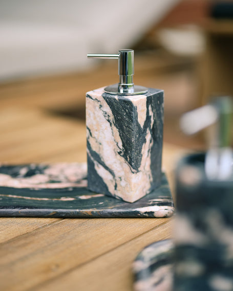 Maldive marble candle and homeware on natural stone